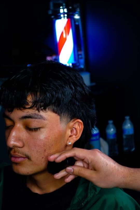 Haircut finishing detail at Refined Barber Studio